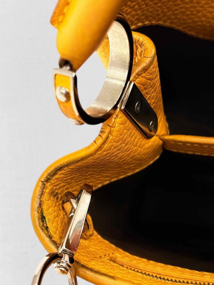 Pre - loved LOUIS VUITTON CAPUCINES Mustard Top Handle at Reems Closet