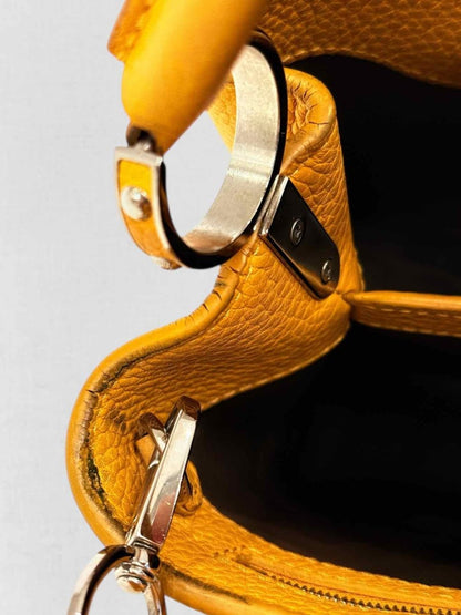 Pre - loved LOUIS VUITTON CAPUCINES Mustard Top Handle at Reems Closet