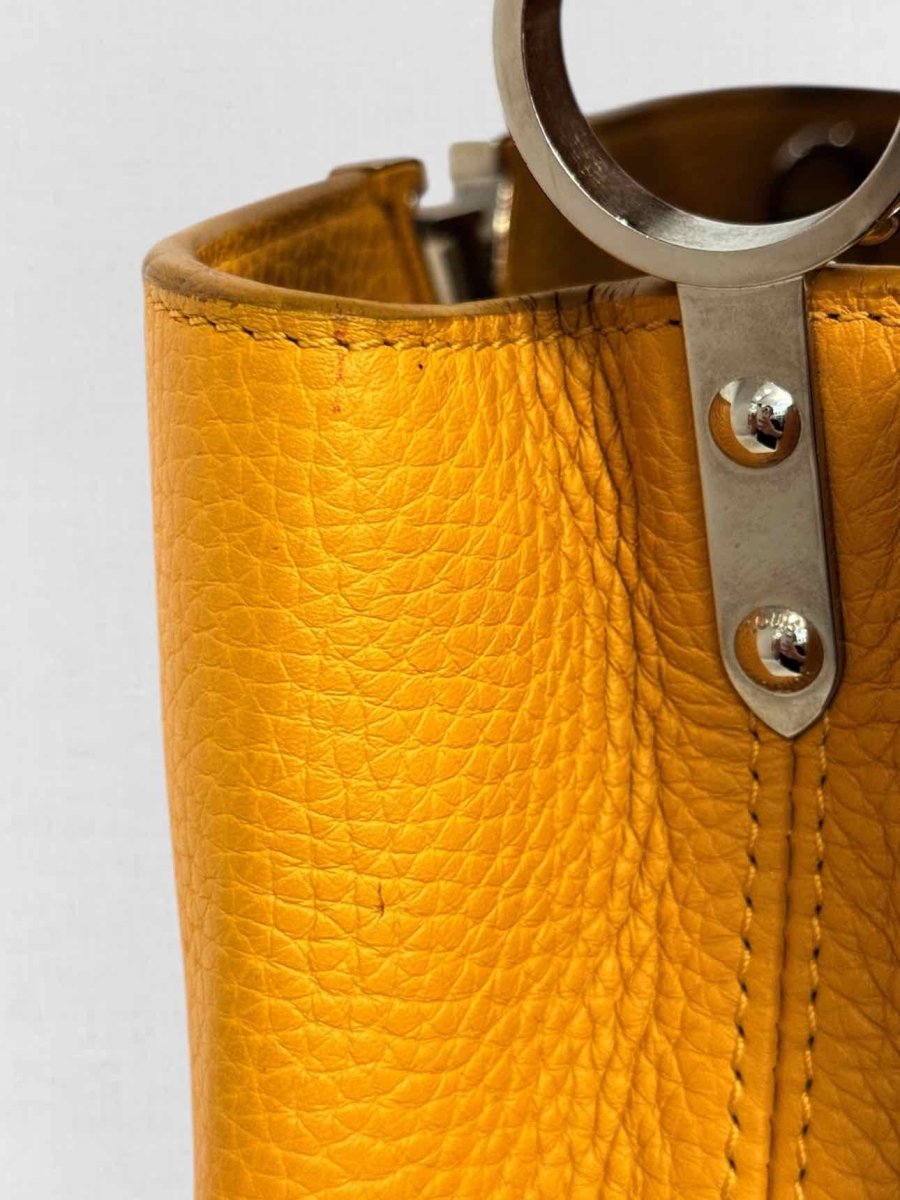 Pre - loved LOUIS VUITTON CAPUCINES Mustard Top Handle at Reems Closet