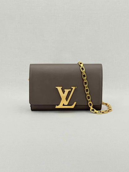 Pre - loved LOUIS VUITTON Chain Louise Taupe Clutch at Reems Closet
