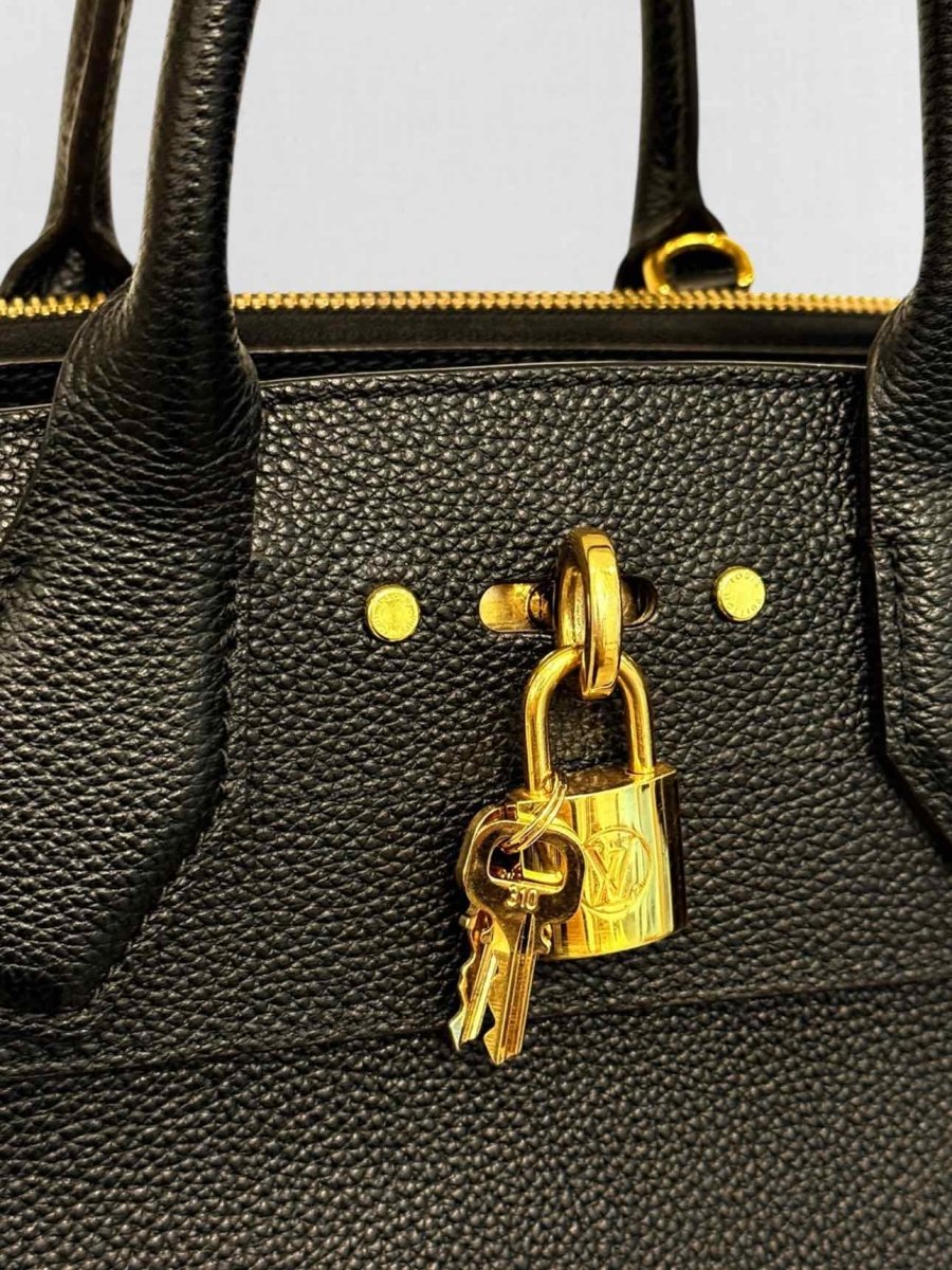 Pre - loved LOUIS VUITTON City Streamer Black Top Handle at Reems Closet