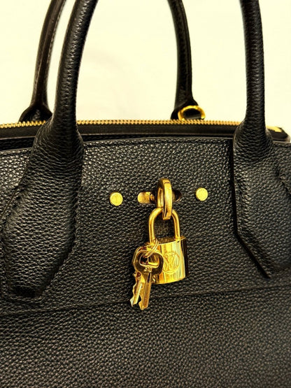 Pre - loved LOUIS VUITTON City Streamer Black Top Handle at Reems Closet