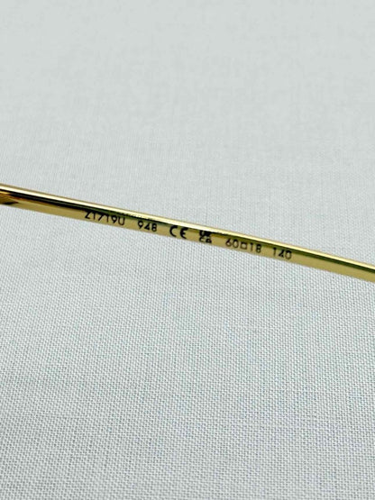 Pre-loved LOUIS VUITTON Gold Sunglasses at Reems Closet
