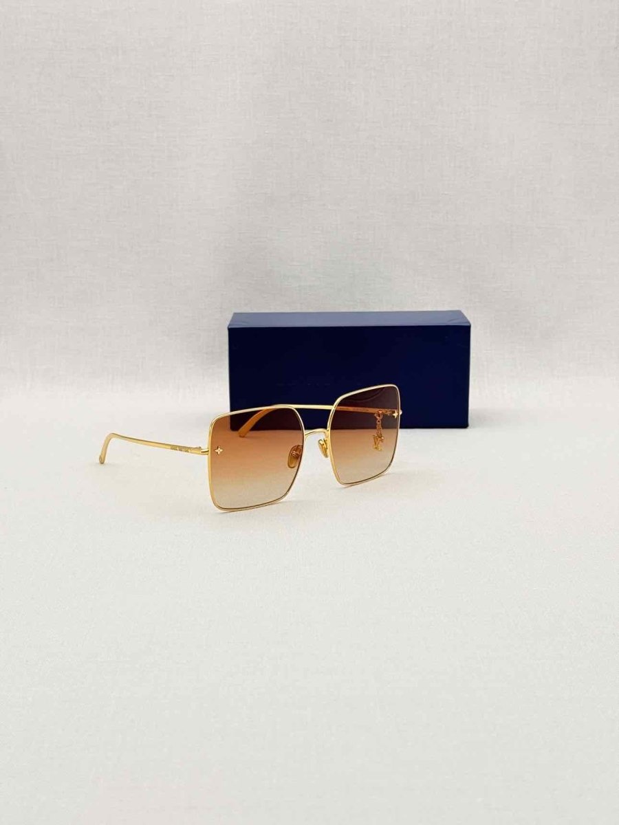 Pre-loved LOUIS VUITTON Gold Sunglasses at Reems Closet