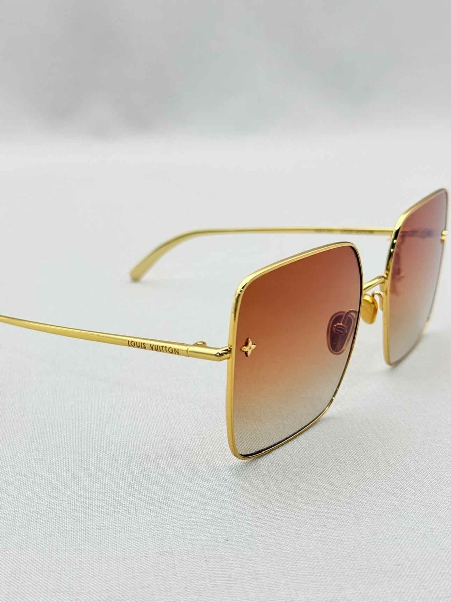 Pre-loved LOUIS VUITTON Gold Sunglasses at Reems Closet