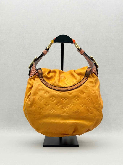 Pre - loved LOUIS VUITTON Kalahari Mustard Hobo bag at Reems Closet