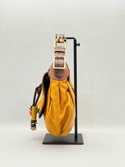 Pre - loved LOUIS VUITTON Kalahari Mustard Hobo bag at Reems Closet