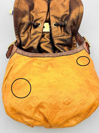 Pre - loved LOUIS VUITTON Kalahari Mustard Hobo bag at Reems Closet