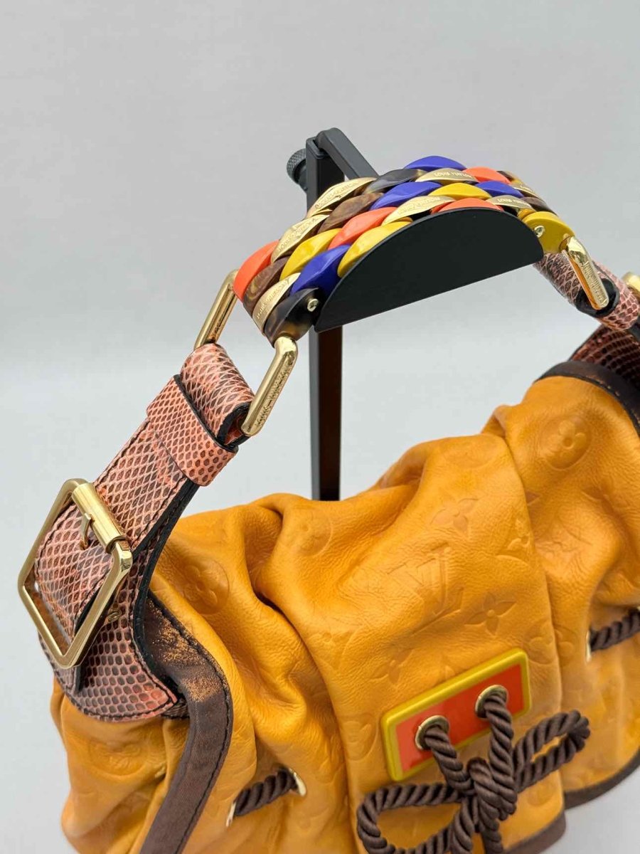 Pre - loved LOUIS VUITTON Kalahari Mustard Hobo bag at Reems Closet