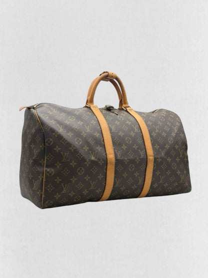 Pre - loved LOUIS VUITTON Keepall Brown Monogram Duffel bag at Reems Closet