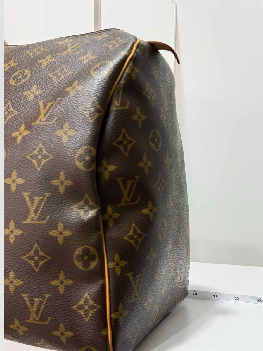 Pre - loved LOUIS VUITTON Keepall Brown Monogram Duffel bag at Reems Closet