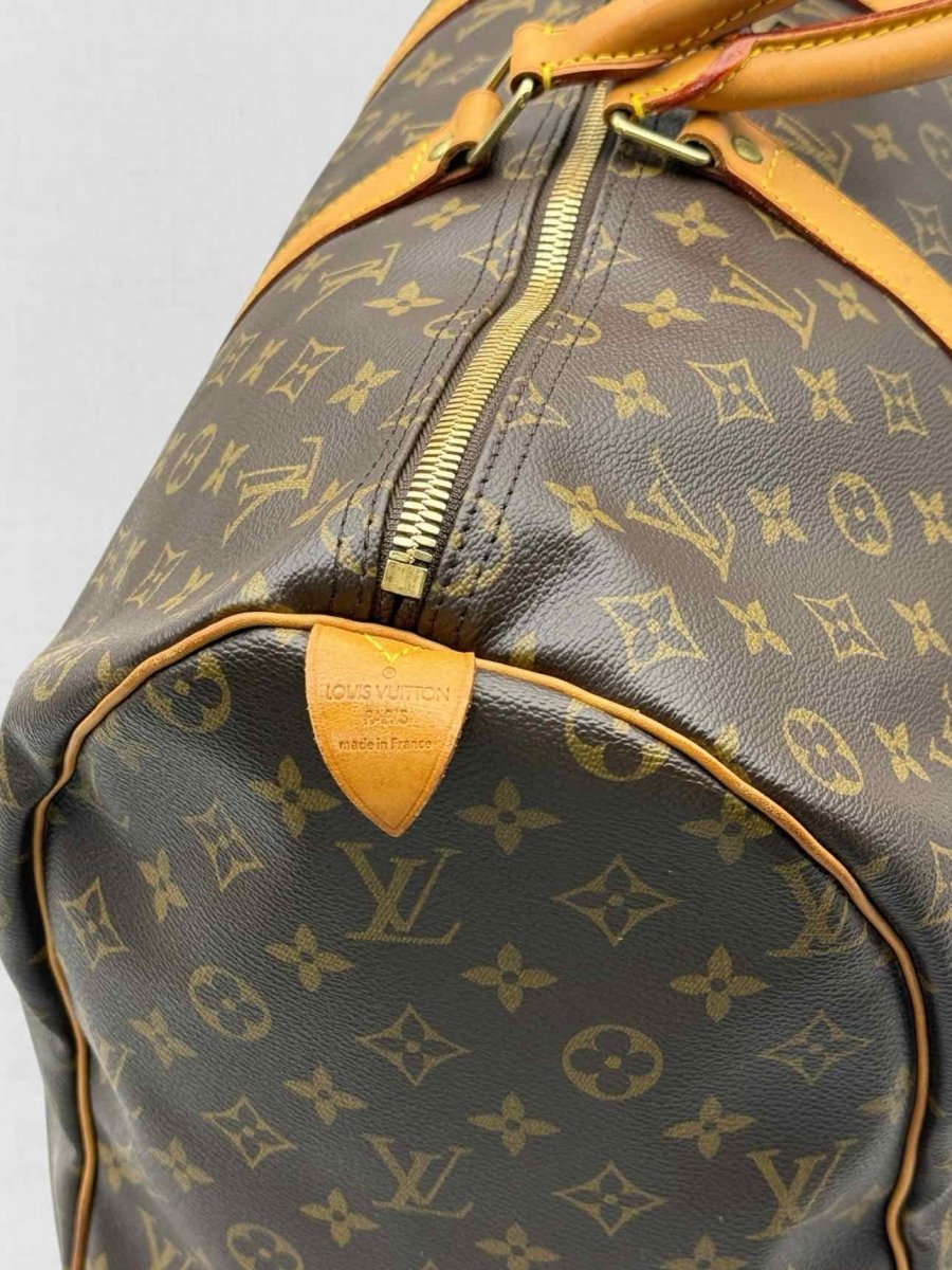 Pre - loved LOUIS VUITTON Keepall Brown Monogram Duffel bag at Reems Closet