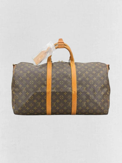 Pre - loved LOUIS VUITTON Keepall Brown Monogram Duffel bag at Reems Closet