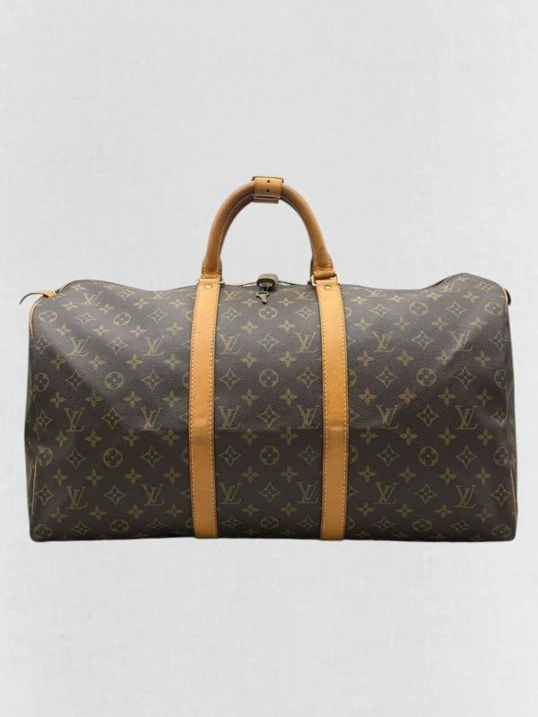 Pre - loved LOUIS VUITTON Keepall Brown Monogram Duffel bag at Reems Closet