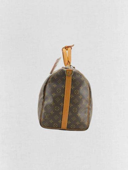 Pre - loved LOUIS VUITTON Keepall Brown Monogram Duffel bag at Reems Closet