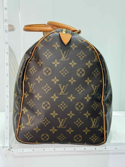 Pre - loved LOUIS VUITTON Keepall Brown Monogram Duffel bag at Reems Closet