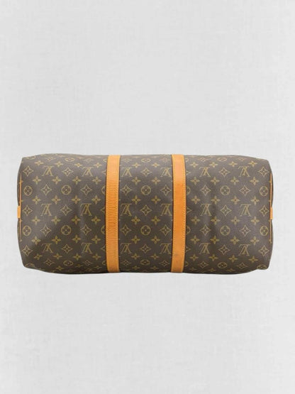 Pre - loved LOUIS VUITTON Keepall Brown Monogram Duffel bag at Reems Closet