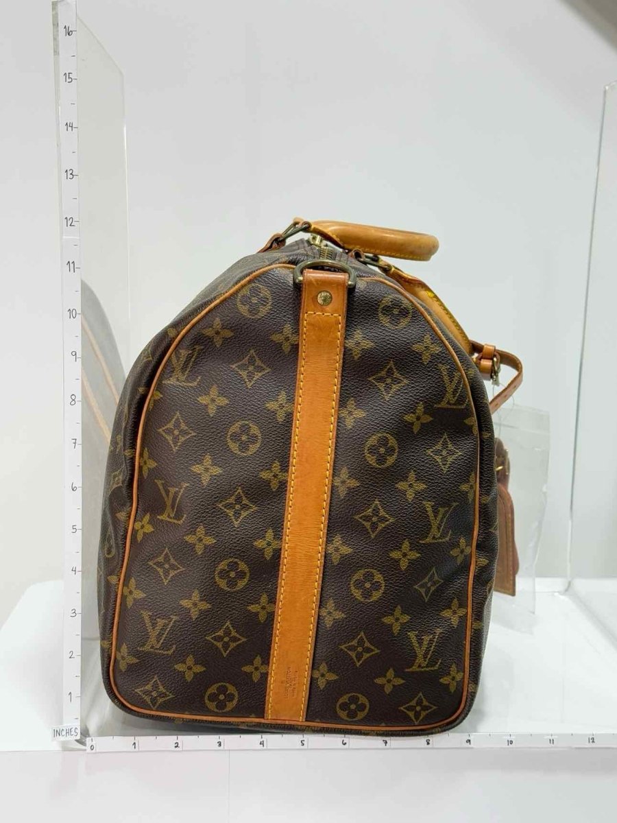 Pre - loved LOUIS VUITTON Keepall Brown Monogram Duffel bag at Reems Closet