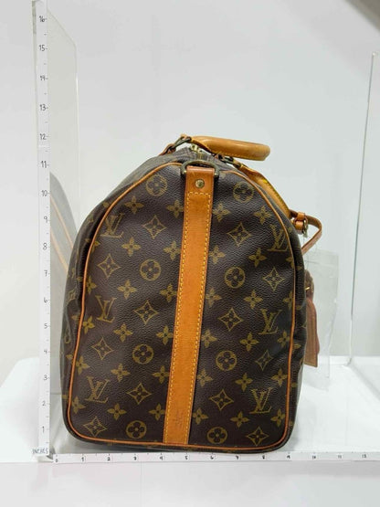 Pre - loved LOUIS VUITTON Keepall Brown Monogram Duffel bag at Reems Closet