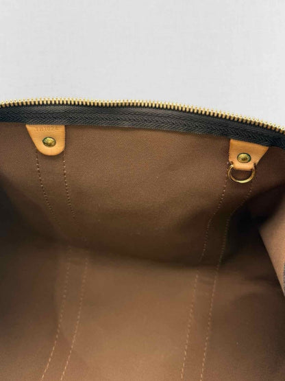 Pre - loved LOUIS VUITTON Keepall Brown Monogram Duffel bag at Reems Closet