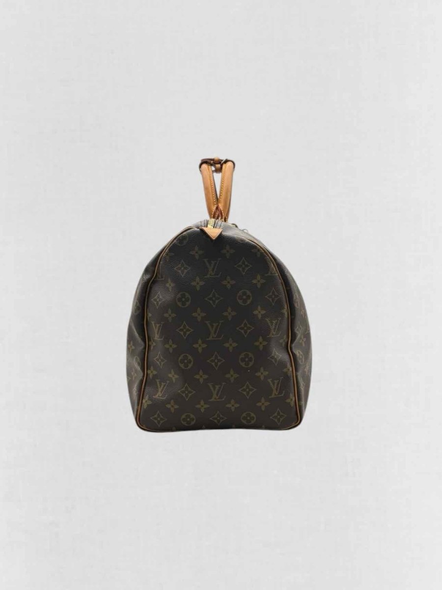 Pre - loved LOUIS VUITTON Keepall Brown Monogram Duffel bag at Reems Closet
