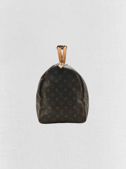 Pre - loved LOUIS VUITTON Keepall Brown Monogram Duffel bag at Reems Closet