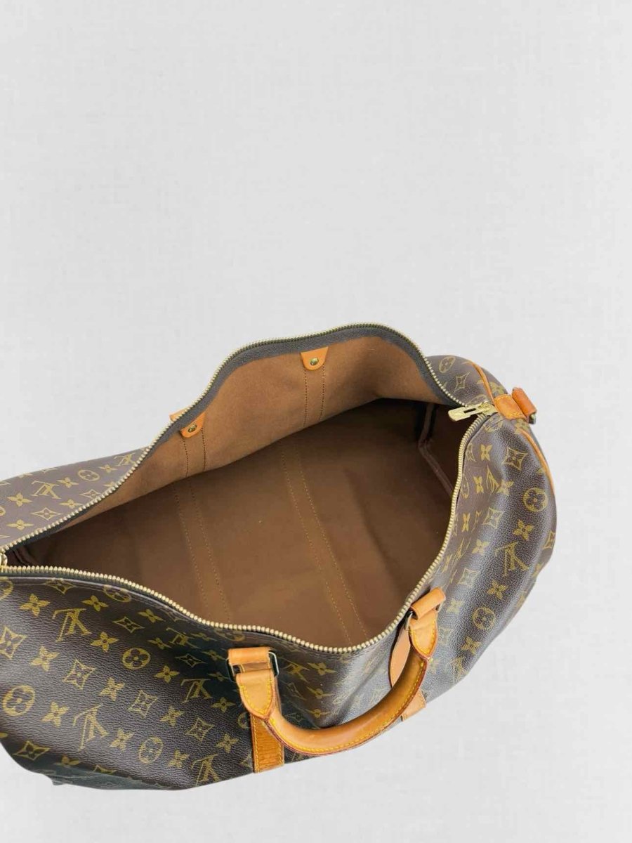 Pre - loved LOUIS VUITTON Keepall Brown Monogram Duffel bag at Reems Closet