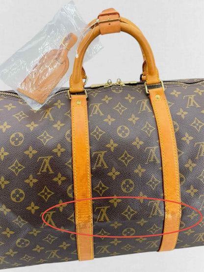 Pre - loved LOUIS VUITTON Keepall Brown Monogram Duffel bag at Reems Closet