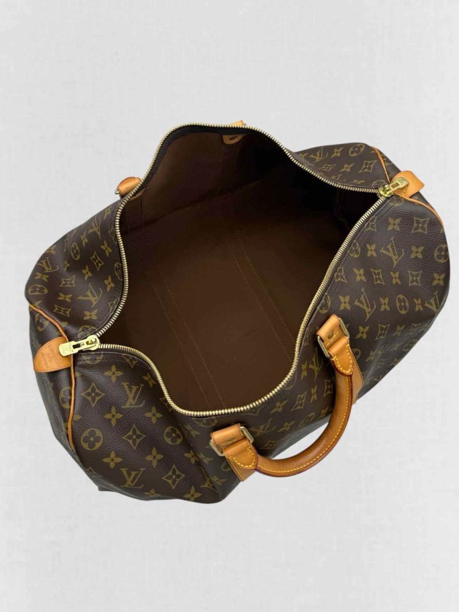Pre - loved LOUIS VUITTON Keepall Brown Monogram Duffel bag at Reems Closet
