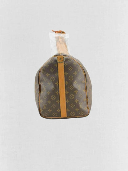 Pre - loved LOUIS VUITTON Keepall Brown Monogram Duffel bag at Reems Closet