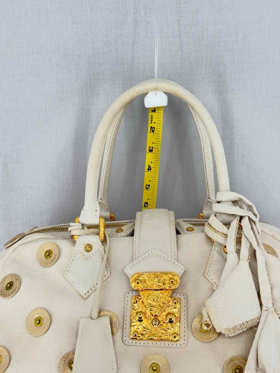 Pre - loved LOUIS VUITTON Limited Edition Beige Top Handle at Reems Closet