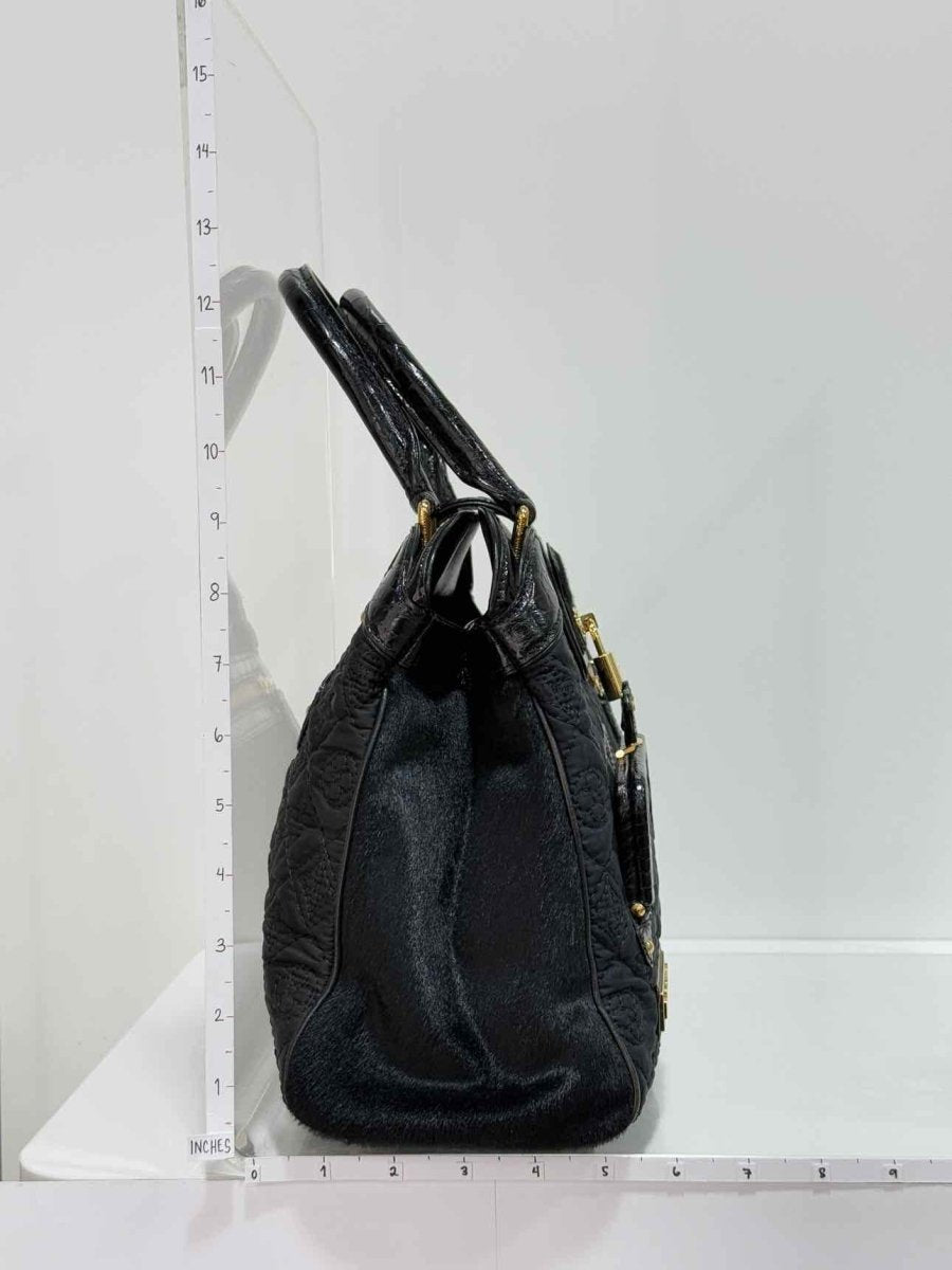 Pre - loved LOUIS VUITTON Limited Edition Black Monogram Top Handle at Reems Closet