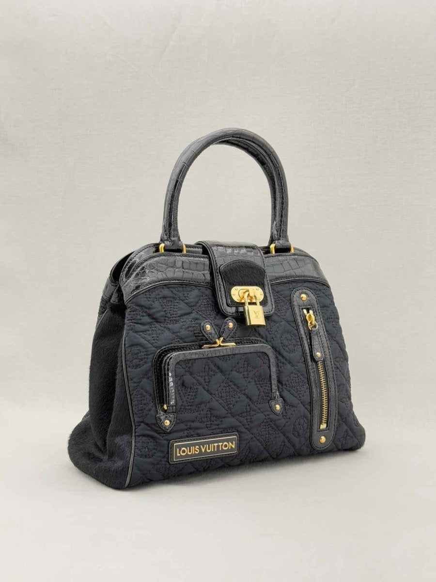 Pre - loved LOUIS VUITTON Limited Edition Black Monogram Top Handle at Reems Closet