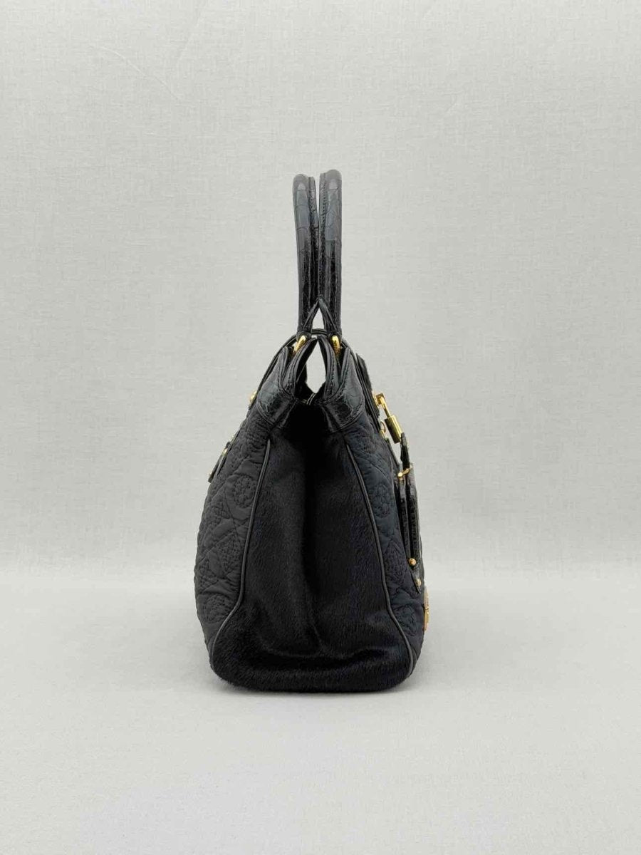 Pre - loved LOUIS VUITTON Limited Edition Black Monogram Top Handle at Reems Closet