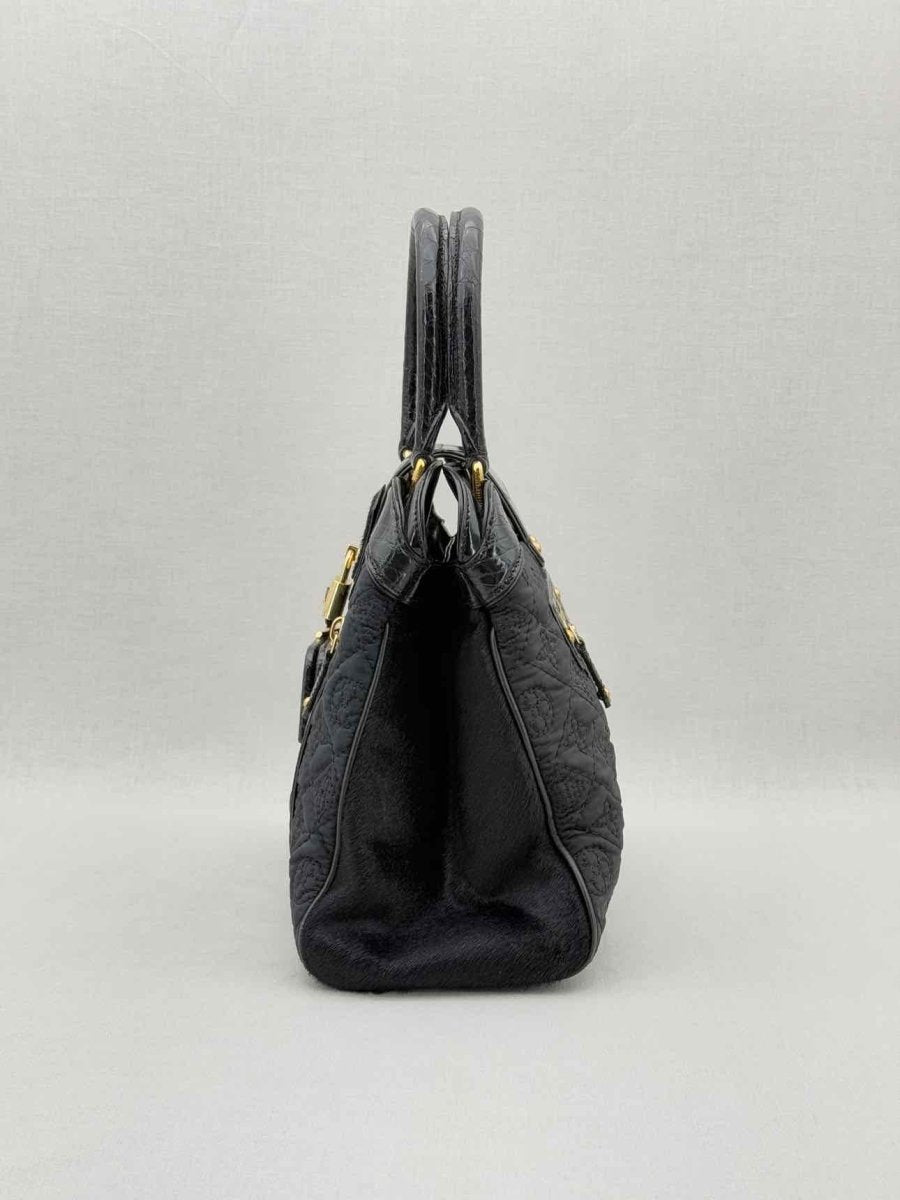 Pre - loved LOUIS VUITTON Limited Edition Black Monogram Top Handle at Reems Closet