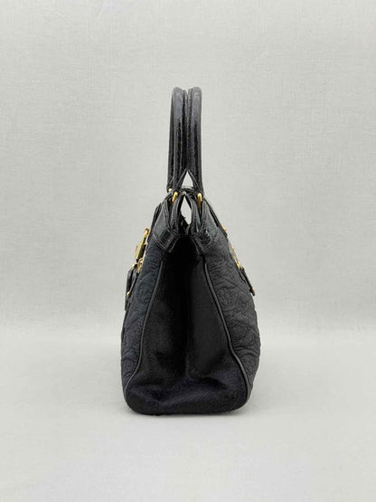 Pre - loved LOUIS VUITTON Limited Edition Black Monogram Top Handle at Reems Closet