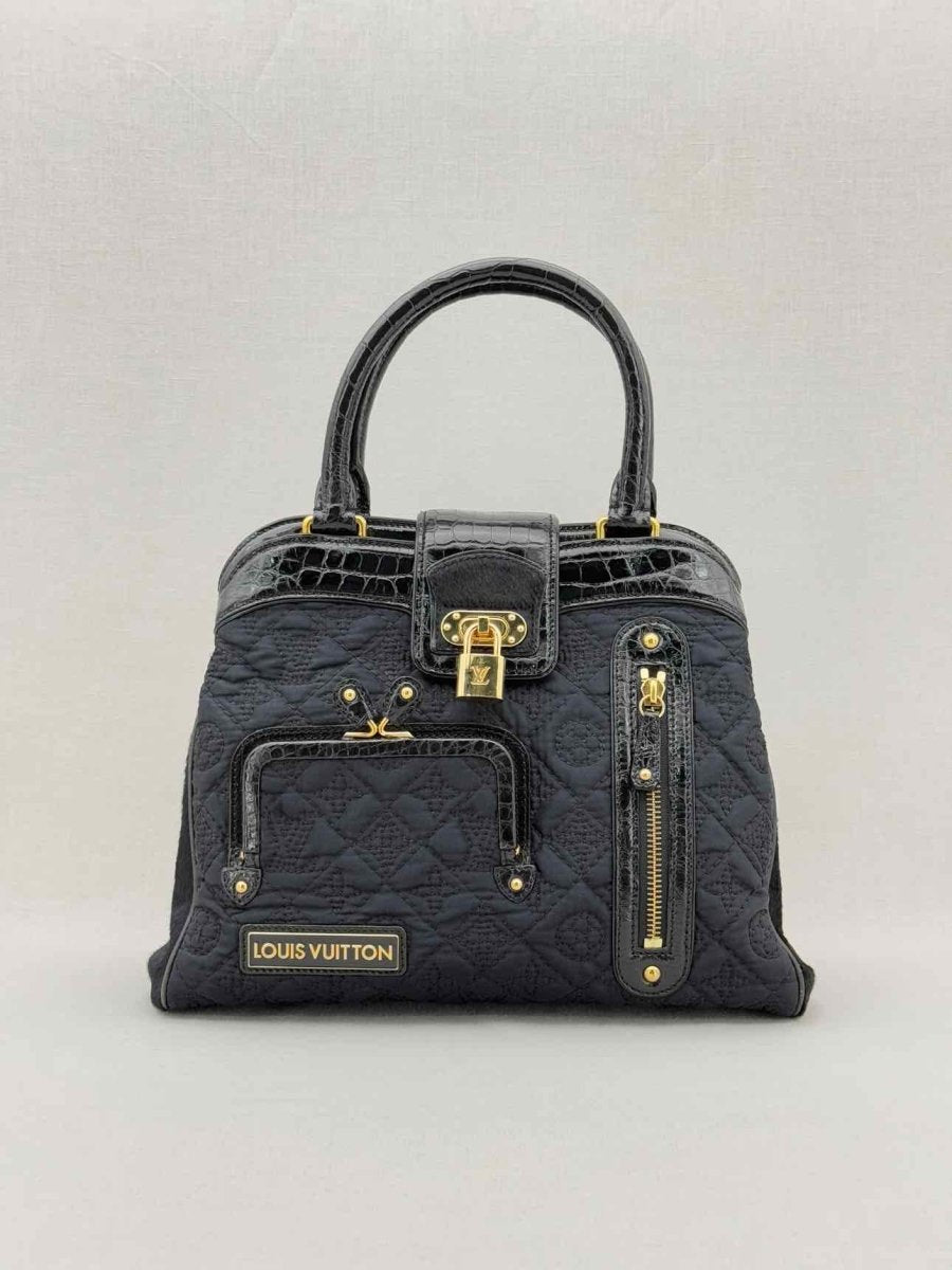 Pre - loved LOUIS VUITTON Limited Edition Black Monogram Top Handle at Reems Closet