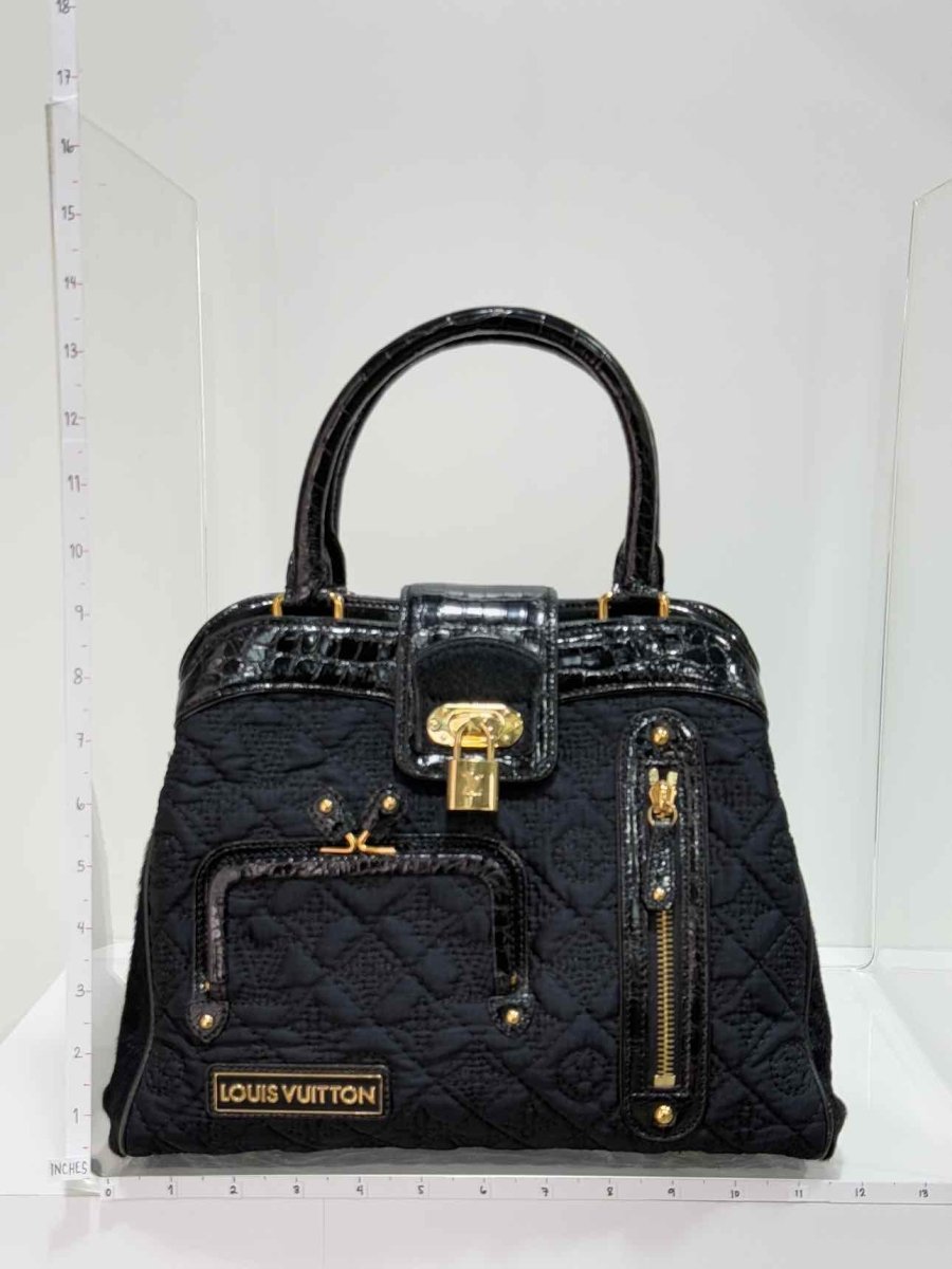 Pre - loved LOUIS VUITTON Limited Edition Black Monogram Top Handle at Reems Closet