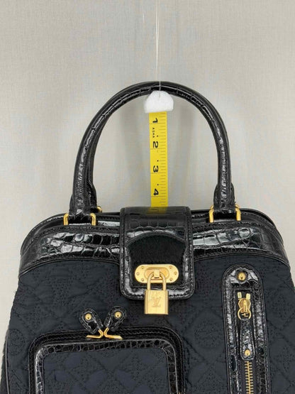 Pre - loved LOUIS VUITTON Limited Edition Black Monogram Top Handle at Reems Closet