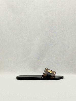 Pre-loved LOUIS VUITTON LOCK IT Brown & Black Size EU 37.5 Slides at Reems Closet
