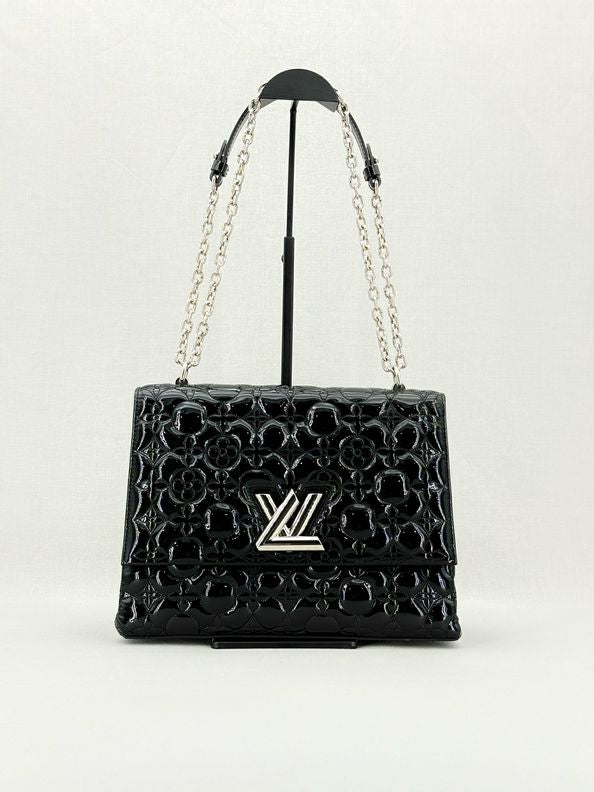 Pre - loved LOUIS VUITTON Malletage Twist Black Shoulder Bag at Reems Closet
