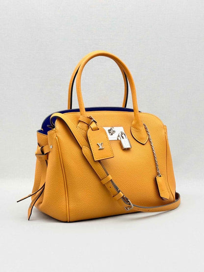 Pre - loved LOUIS VUITTON Mila Orange Tote Bag at Reems Closet