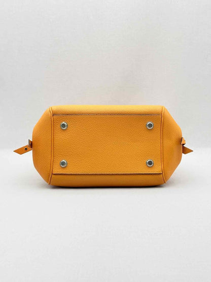 Pre - loved LOUIS VUITTON Mila Orange Tote Bag at Reems Closet