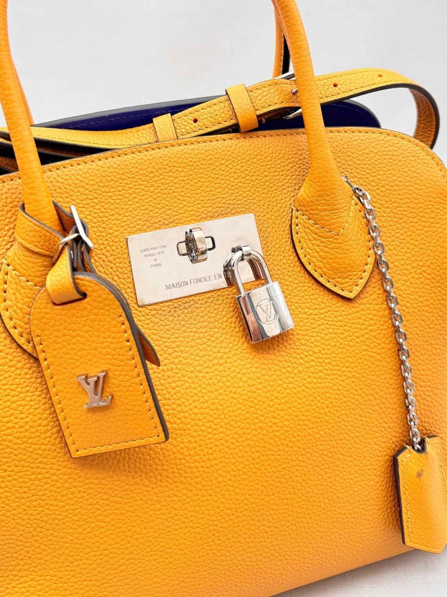 Pre - loved LOUIS VUITTON Mila Orange Tote Bag at Reems Closet
