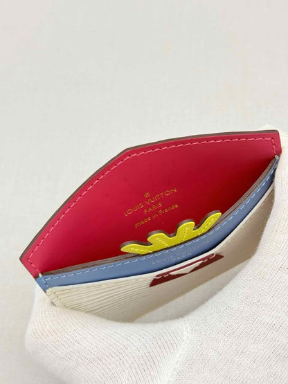 Pre - loved LOUIS VUITTON Off - white Card Holder at Reems Closet