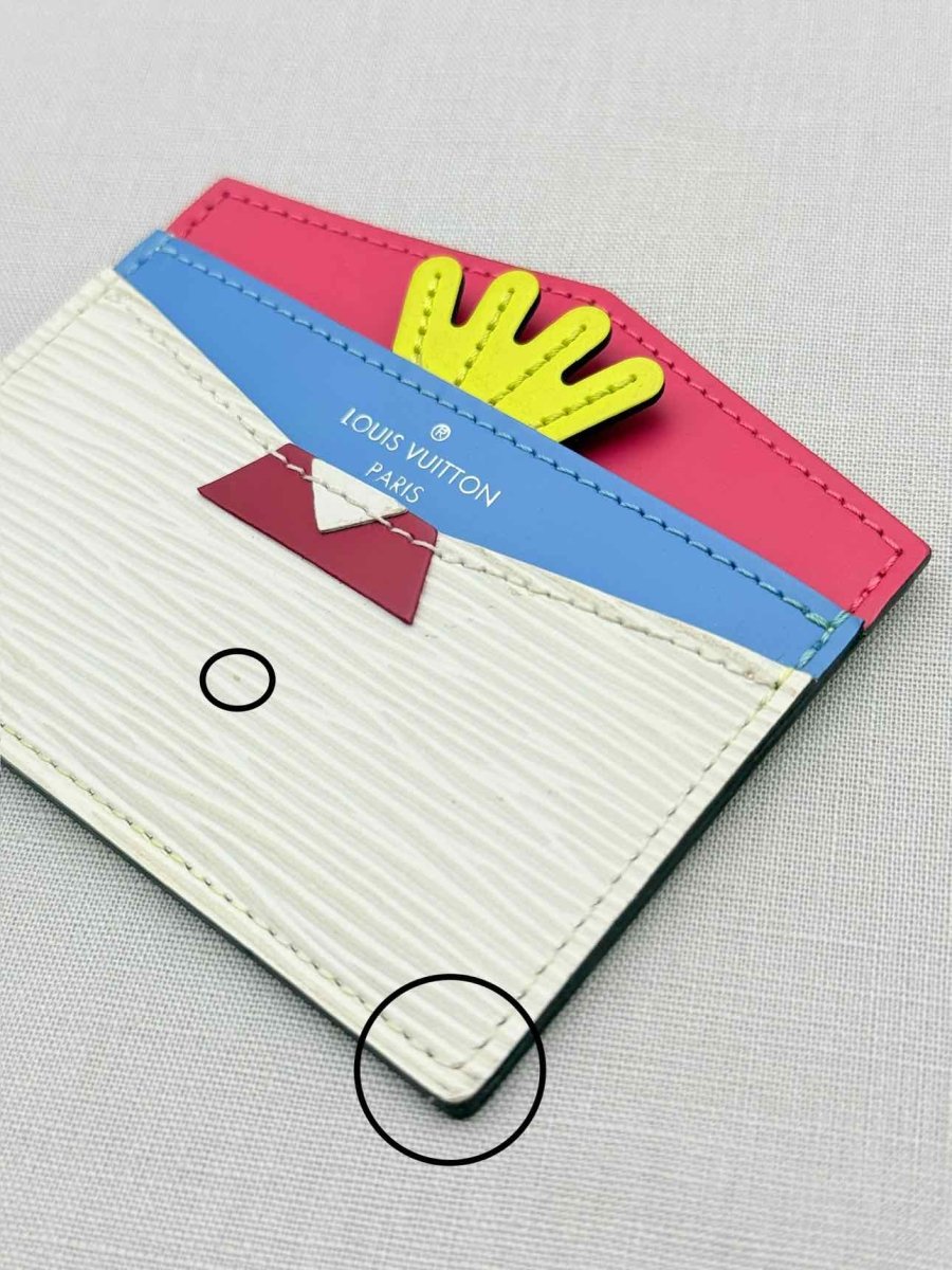 Pre - loved LOUIS VUITTON Off - white Card Holder at Reems Closet