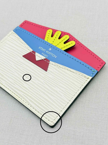 Pre - loved LOUIS VUITTON Off - white Card Holder at Reems Closet