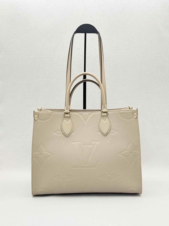 Pre-loved LOUIS VUITTON Onthego Cream Monogram Empriente Tote Bag at Reems Closet