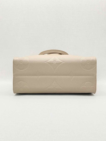 Pre-loved LOUIS VUITTON Onthego Cream Monogram Empriente Tote Bag at Reems Closet