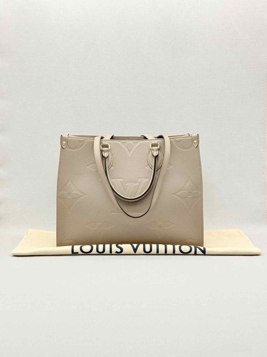 Pre-loved LOUIS VUITTON Onthego Cream Monogram Empriente Tote Bag at Reems Closet